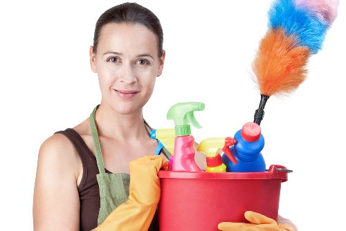 Cleaning technician preparing carpet cleaning equipment